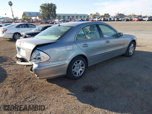 2005 Mercedes-Benz E-Class 3.2L with VIN WDBUF65J05A646577, listed as a IAAI auction lot 41666861 with 106,012 mi miles. Bid and sale history available at carsss.com. Image 4.