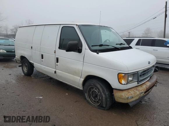 2001 Ford Econoline Cargo with VIN 1FTRE142X1HB27593, listed as a Copart auction lot 83827154 with 190,761 mi miles and Salvage Title. Bid and sale history available at DreamBid. Image 4.