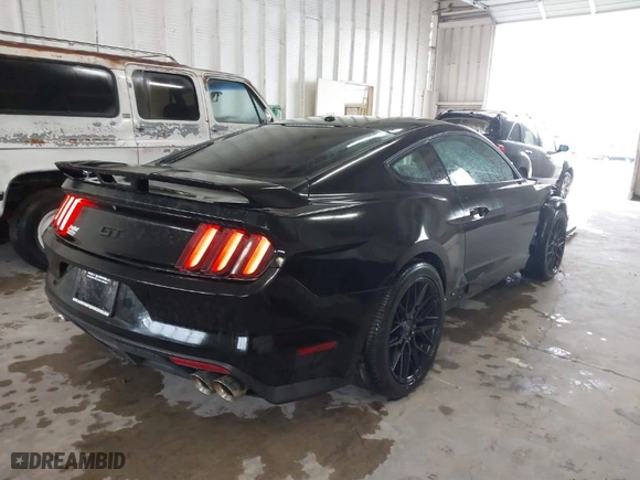 2015 Ford Mustang GT with VIN 1FA6P8CF1F5335127, listed as a IAAI auction lot 41757181 with 77,134 mi miles. Bid and sale history available at carsss.com. Image 4.