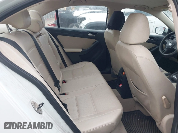 2014 Volkswagen Jetta SE with VIN 3VWD07AJ8EM296808, listed as a IAAI auction lot 41894682 with 193,898 mi miles and . Bid and sale history available at DreamBid. Image 8.