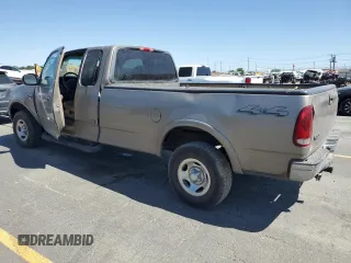 2001 Ford F-150 XL with VIN 1FTRX18L91KF24633, listed as a Copart auction lot 63276345 with Not provided miles and Salvage title. Bid and sale history available at DreamBid. Image 2.