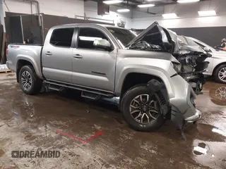 2021 Toyota Tacoma SR z VIN 3TYCZ5AN5MT023940, wystawiony jako IAAI lot #41541896 z przebiegiem 46 209 mil mil oraz . Historia ofert i sprzedaży dostępna na DreamBid. Obrazek 1.