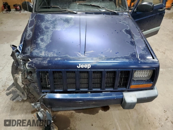 2000 Jeep Cherokee z VIN 1J4FF48S0YL153259, wystawiony jako Copart lot #52509955 z przebiegiem 204 042 mil mil oraz Czysty tytuł • Clean title. Historia ofert i sprzedaży dostępna na DreamBid. Obrazek 12.