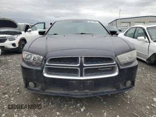 2013 Dodge Charger SXT z VIN 2C3CDXHG6DH525694, wystawiony jako Copart lot #54911495 z przebiegiem 189 992 mil mil oraz Szkoda całkowita • Salvage title. Historia ofert i sprzedaży dostępna na DreamBid. Obrazek 5.