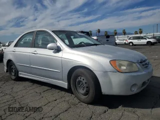 2006 Kia Spectra EX with VIN KNAFE122765228554, listed as a Copart auction lot 78458004 with 154,085 mi miles and Clean Title. Bid and sale history available at carsss.com. Image 4.