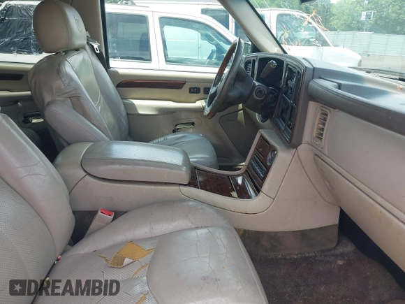 2003 Cadillac Escalade z VIN 1GYEC63T73R187253, wystawiony jako IAAI lot #42299186 z przebiegiem 288 373 mil mil oraz . Historia ofert i sprzedaży dostępna na DreamBid. Obrazek 5.