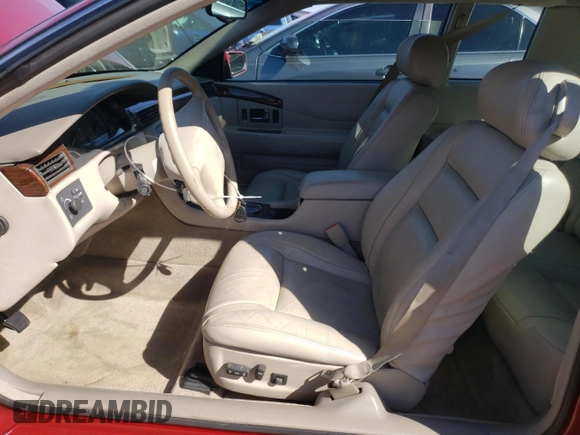 2000 Cadillac Eldorado Touring ETC z VIN 1G6ET129XYU191433, wystawiony jako Copart lot #58108224 z przebiegiem 76 957 mil mil oraz Szkody całkowita. Historia ofert i sprzedaży dostępna na DreamBid. Obrazek 7.