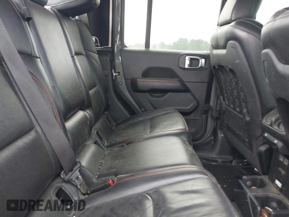 2021 Jeep Gladiator Rubicon with VIN 1C6JJTBG7ML554354, listed as a IAAI auction lot 41796943 with 61,513 mi miles and . Bid and sale history available at DreamBid. Image 8.