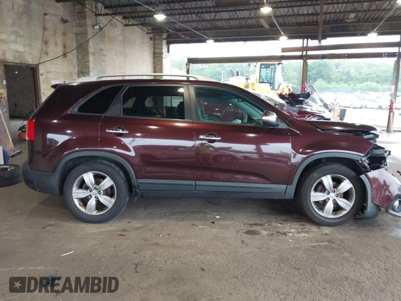 2012 Kia Sorento EX z VIN 5XYKU4A25CG304508, wystawiony jako IAAI lot #42461847 z przebiegiem 20 016 mil mil oraz . Historia ofert i sprzedaży dostępna na DreamBid. Obrazek 13.