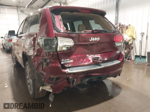 2018 Jeep Grand Cherokee High Altitude with VIN 1C4RJFCG6JC215902, listed as a IAAI auction lot 41866716 with 76,282 mi miles. Bid and sale history available at carsss.com. Image 6.
