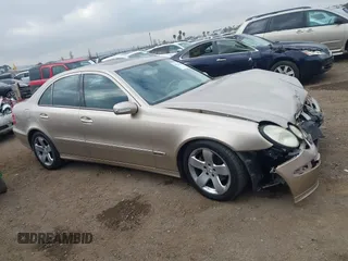 2005 Mercedes-Benz E-Class 3.2L with VIN WDBUF65J25A614469, listed as a IAAI auction lot 41521864 with 90,403 mi miles. Bid and sale history available at carsss.com. Image 13.
