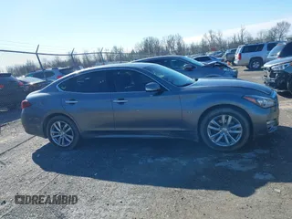 2018 Infiniti Q70 Luxe with VIN JN1BY1AR3JM220783, listed as a IAAI auction lot 41480241 with 95,739 mi miles and . Bid and sale history available at DreamBid. Image 13.