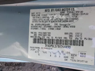2011 Ford Fusion Hybrid with VIN 3FADP0L37BR264490, listed as a IAAI auction lot 42253495 with 112,866 mi miles and . Bid and sale history available at DreamBid. Image 9.