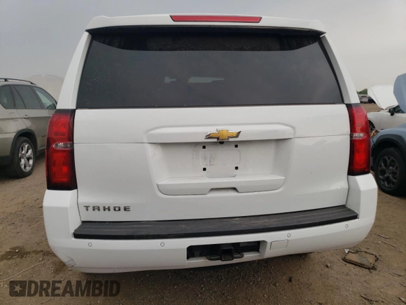 2018 Chevrolet Tahoe LT с VIN 1GNSKBKCXJR155195, выставлен на аукционе Copart как лот 58483325 с пробегом 96 600 миль миль и Списание • Salvage title. История ставок и продаж доступна на DreamBid. Изображение 6.