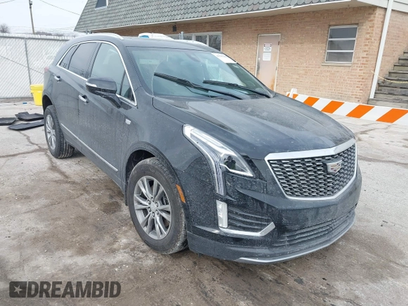 2021 Cadillac XT5 AWD Premium Luxury with VIN 1GYKNDRS7MZ168493, listed as a IAAI auction lot 41395162 with 33,064 mi miles. Bid and sale history available at carsss.com. Image 1.