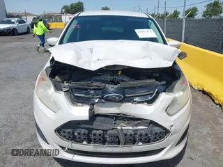 2013 Ford C-Max SE z VIN 1FADP5AU1DL518916, wystawiony jako IAAI lot #42452252 z przebiegiem 250 862 mil mil oraz . Historia ofert i sprzedaży dostępna na DreamBid. Obrazek 13.