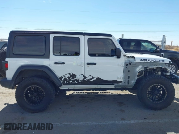 2020 Jeep Wrangler Unlimited Sport with VIN 1C4HJXDG0LW174393, listed as a IAAI auction lot 41575040 with 68,418 mi miles and . Bid and sale history available at DreamBid. Image 14.