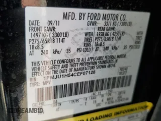2012 Ford Expedition XLT with VIN 1FMJU1H54CEF07128, listed as a Copart auction lot 59270045 with 205,245 mi miles and Salvage title. Bid and sale history available at DreamBid. Image 14.
