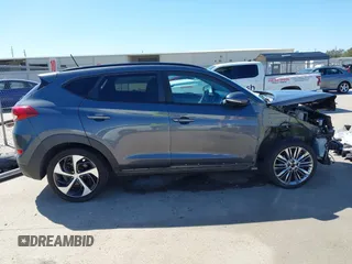 2017 Hyundai Tucson Sport z VIN KM8J33A25HU562988, wystawiony jako IAAI lot #41755874 z przebiegiem 112 000 mil mil oraz . Historia ofert i sprzedaży dostępna na DreamBid. Obrazek 14.