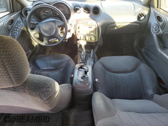 2004 Pontiac Grand Am SE1 with VIN 1G2NF52E34M567770, listed as a Copart auction lot 82089934 with 215,976 mi miles and Salvage Title. Bid and sale history available at carsss.com. Image 8.
