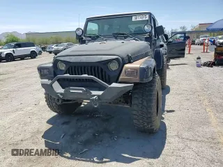 1999 Jeep Wrangler Sahara with VIN 1J4FY49S8XP472733, listed as a Copart auction lot 58174915 with 170,838 mi miles and Salvage title. Bid and sale history available at DreamBid. Image 15.