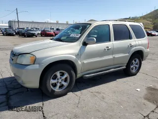 2005 Mazda Tribute S with VIN 4F2CZ06115KM31509, listed as a Copart auction lot 53162964 with 247,251 mi miles and Salvage Title. Bid and sale history available at carsss.com. Image 1.