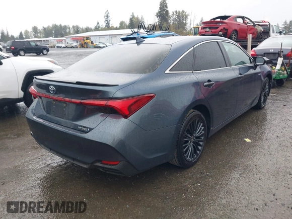2021 Toyota Avalon Hybrid XSE z VIN 4T1EA1AB9MU007905, wystawiony jako IAAI lot #40501204 z przebiegiem 86 869 mil mil oraz . Historia ofert i sprzedaży dostępna na DreamBid. Obrazek 4.