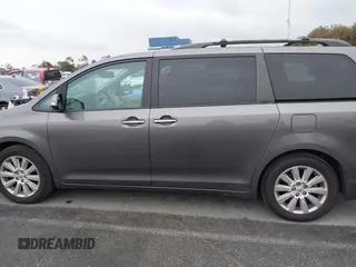 2013 Toyota Sienna XLE with VIN 5TDDK3DCXDS059061, listed as a IAAI auction lot 41777329 with 142,889 mi miles and . Bid and sale history available at DreamBid. Image 14.