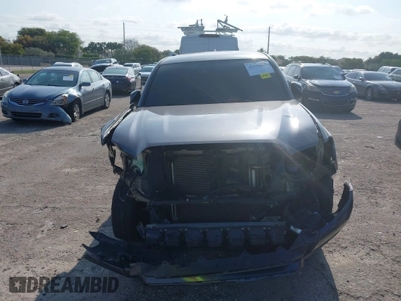 2021 Toyota Tacoma SR with VIN 3TYAX5GN9MT022049, listed as a IAAI auction lot 41958816 with 55,151 mi miles and . Bid and sale history available at DreamBid. Image 6.