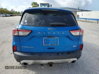 2020 Ford Escape Titanium z VIN 1FMCU9J95LUA37315, wystawiony jako Copart lot #58873545 z przebiegiem Nie podano mil oraz Szkoda całkowita • Salvage title. Historia ofert i sprzedaży dostępna na DreamBid. Obrazek 6.