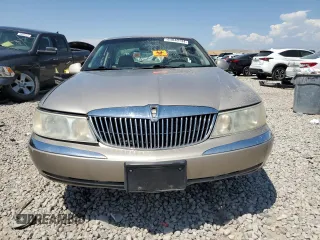 2001 Lincoln Continental with VIN 1LNHM97V21Y698784, listed as a Copart auction lot 64040134 with Not Provided miles and Salvage Title. Bid and sale history available at DreamBid. Image 5.