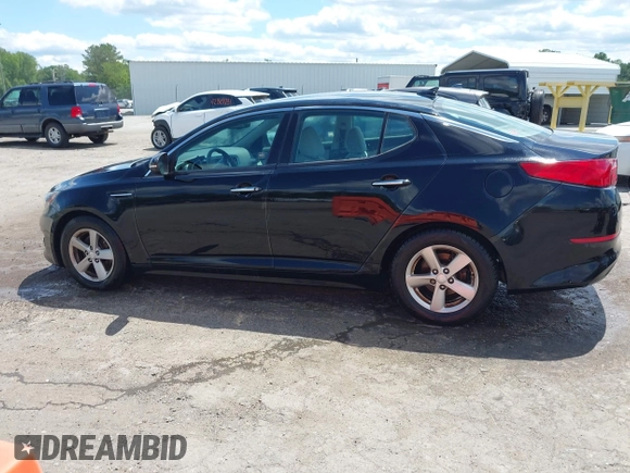 2015 Kia Optima LX with VIN 5XXGM4A71FG387980, listed as a IAAI auction lot 42330602 with 96,189 mi miles and . Bid and sale history available at DreamBid. Image 14.