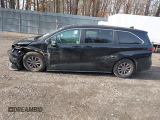 2021 Toyota Sienna LE z VIN 5TDKRKEC9MS043364, wystawiony jako IAAI lot #41515918 z przebiegiem 98 028 mil mil oraz . Historia ofert i sprzedaży dostępna na DreamBid. Obrazek 14.