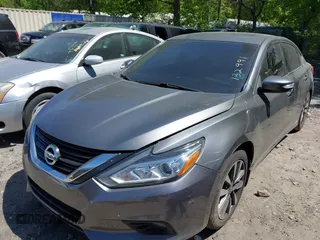 2016 Nissan Altima SR with VIN 1N4AL3AP0GC132991, listed as a IAAI auction lot 42058890 with 185,597 mi miles and . Bid and sale history available at carsss.com. Image 2.