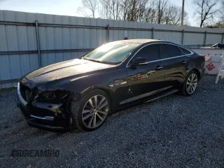 2016 Jaguar XJ R-Sport z VIN SAJWA1C71G8W01582, wystawiony jako Copart lot #88601315 z przebiegiem 57 158 mil mil oraz Szkoda całkowita • Salvage title. Historia ofert i sprzedaży dostępna na DreamBid. Obrazek 1.