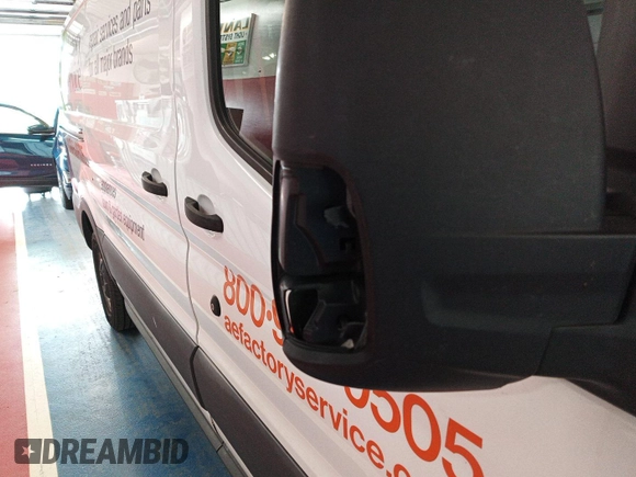 2016 Ford Transit Cargo z VIN 1FTYE1YM8GKB19172, wystawiony jako IAAI lot #42788511 z przebiegiem 143 978 mil mil oraz . Historia ofert i sprzedaży dostępna na DreamBid. Obrazek 3.