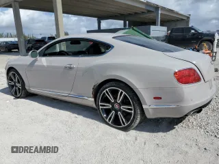 2014 Bentley Continental GT with VIN SCBFT7ZA7EC094358, listed as a Copart auction lot 42711585 with 19,779 mi miles and Salvage Title. Bid and sale history available at DreamBid. Image 2.