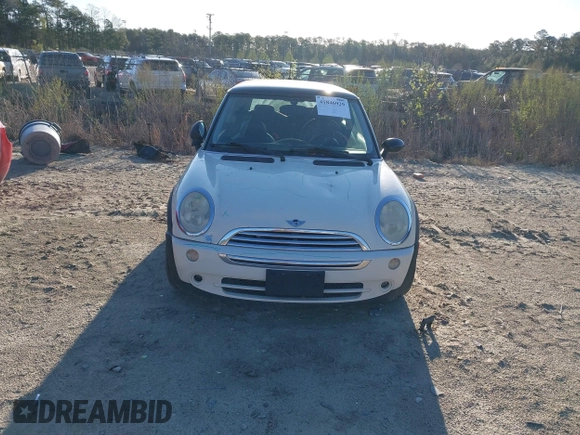 2006 MINI Hardtop with VIN WMWRC335X6TK16871, listed as a IAAI auction lot 41846929 with 145,709 mi miles and . Bid and sale history available at DreamBid. Image 6.
