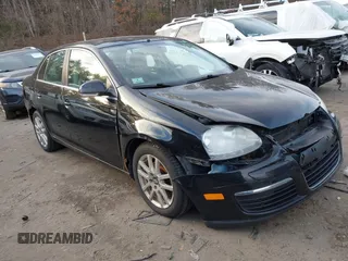 2009 Volkswagen Jetta Sedan SE with VIN 3VWRZ71KX9M057075, listed as a IAAI auction lot 41317166 with 104,052 mi miles. Bid and sale history available at carsss.com. Image 1.