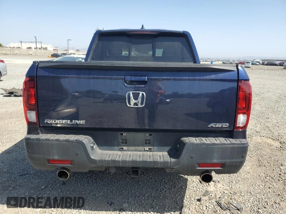 2021 Honda Ridgeline RTL-E with VIN 5FPYK3F75MB001663, listed as a Copart auction lot 61952705 with 52,093 mi miles and Salvage title. Bid and sale history available at DreamBid. Image 6.