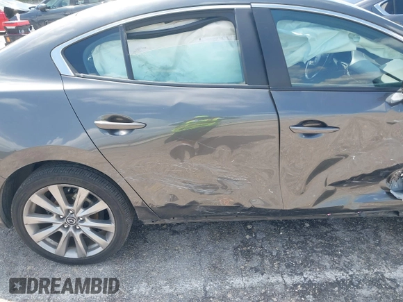 2023 Mazda 3 S Preferred with VIN 3MZBPACM8PM361196, listed as a IAAI auction lot 41940018 with 49,759 mi miles and . Bid and sale history available at DreamBid. Image 20.