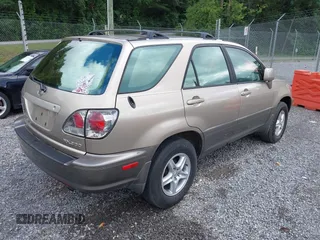 2002 Lexus RX 300 with VIN JTJGF10U220135180, listed as a IAAI auction lot 42646437 with 184,559 mi miles and . Bid and sale history available at DreamBid. Image 4.