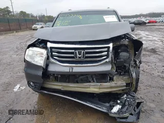 2015 Honda Pilot EX-L with VIN 5FNYF4H51FB064583, listed as a IAAI auction lot 41977746 with 120,398 mi miles and . Bid and sale history available at carsss.com. Image 6.