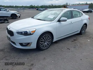 2015 Kia Cadenza Premium with VIN KNALN4D79F5178379, listed as a IAAI auction lot 41594983 with 56,205 mi miles. Bid and sale history available at carsss.com. Image 2.