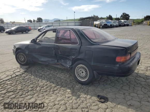 1993 Toyota Camry LE with VIN JT2SK12E4P0112014, listed as a Copart auction lot 52822095 with 249,458 mi miles and Salvage Title. Bid and sale history available at carsss.com. Image 2.