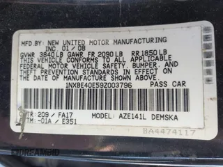 2009 Toyota Corolla XRS with VIN 1NXBE40E59Z003796, listed as a IAAI auction lot 42077772 with 215,159 mi miles. Bid and sale history available at carsss.com. Image 9.