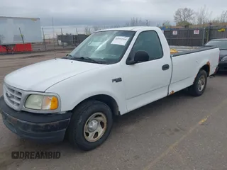 2003 Ford F-150 XL with VIN 1FTRF17273NA15637, listed as a IAAI auction lot 41952924 with 215,704 mi miles and . Bid and sale history available at DreamBid. Image 2.