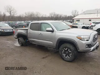 2019 Toyota Tacoma SR z VIN 3TMCZ5AN7KM246599, wystawiony jako IAAI lot #41832393 z przebiegiem 46 054 mil mil oraz . Historia ofert i sprzedaży dostępna na DreamBid. Obrazek 1.