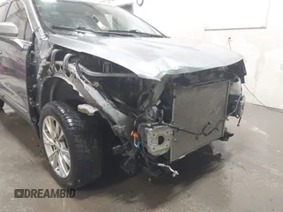 2021 Cadillac XT5 AWD Luxury with VIN 1GYKNBR42MZ165944, listed as a IAAI auction lot 42062750 with 51,592 mi miles and . Bid and sale history available at DreamBid. Image 6.