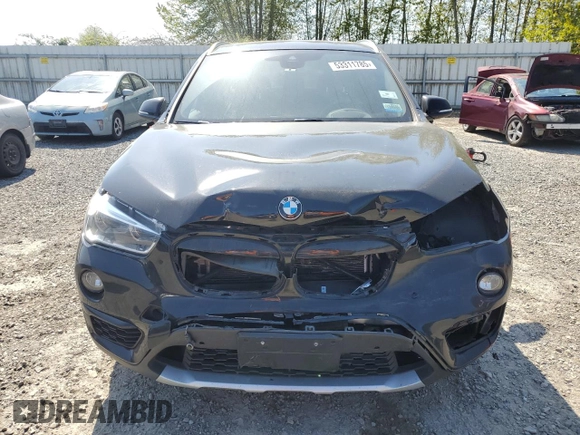 2017 BMW X1 xDrive28i with VIN WBXHT3C32H5F82141, listed as a Copart auction lot 53311785 with 52,867 mi miles and Salvage Title. Bid and sale history available at carsss.com. Image 5.